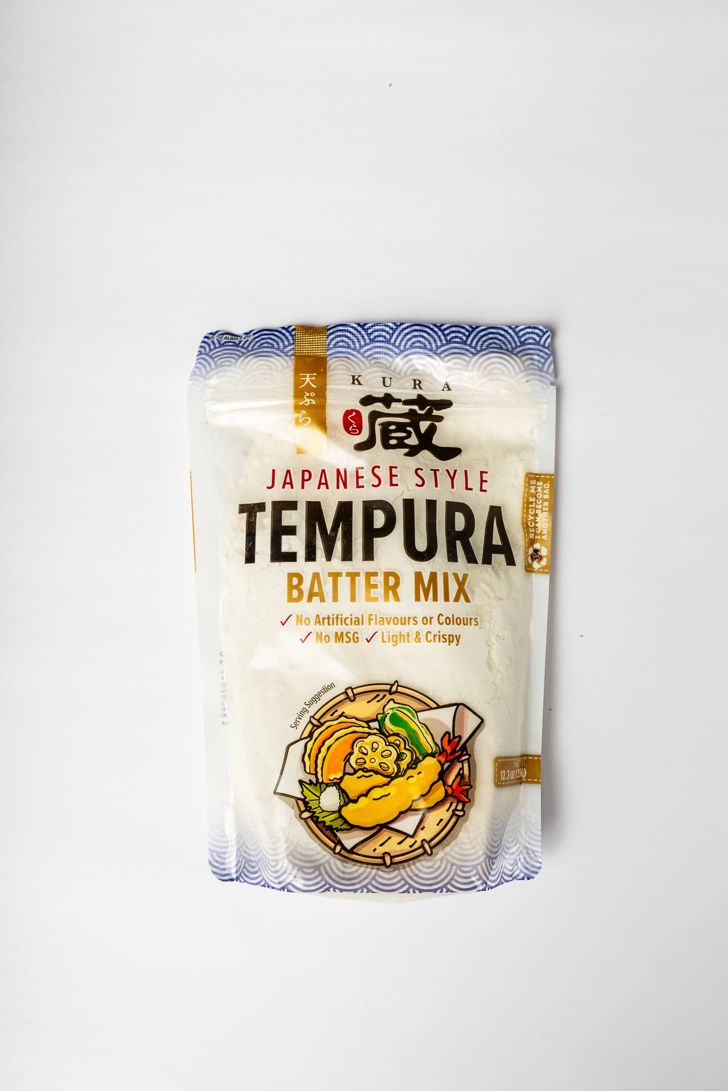 A package of Kura Japanese Style Tempura Batter Mix on a clean white background. The packaging is white with blue wave patterns at the top and bottom, featuring the brand name 'KURA' and the product name 'TEMPURA BATTER MIX' in bold text.