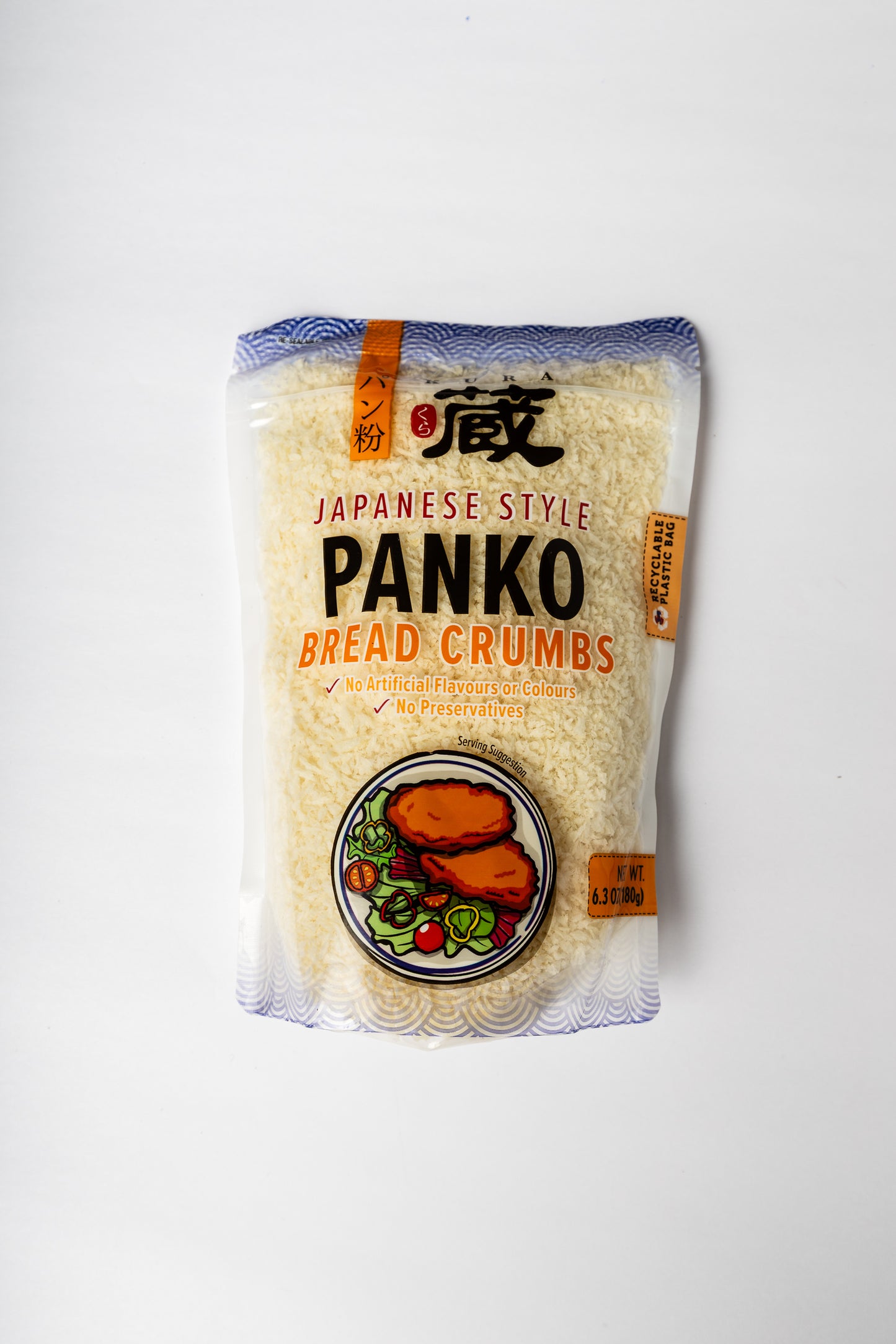 A package of Japanese Style Panko Bread Crumbs, featuring a clear plastic bag filled with light-colored crumb crumbs, with a graphic of fried fish on a plate at the bottom, set against a plain white background.